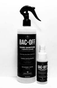 Hand sanitizer bottles with spray nozzles.