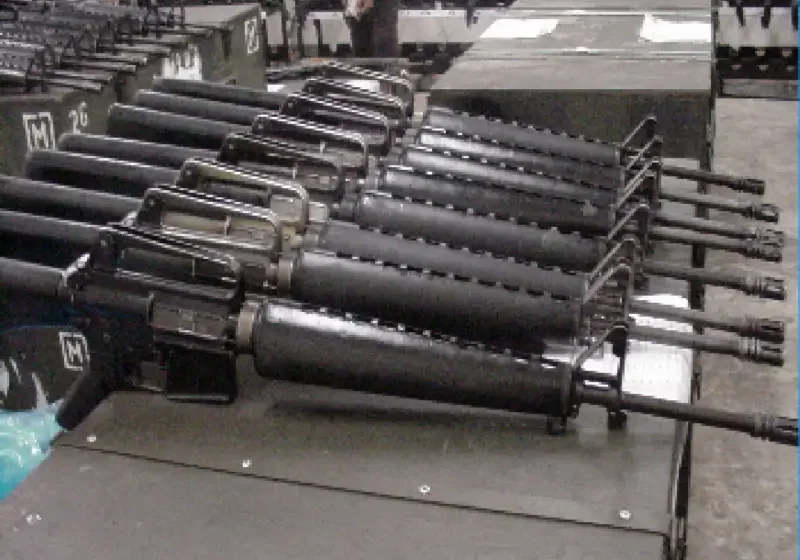 Assault rifles lying on a table
