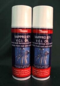 Two bottles of Magna VAPPRO 871 V.C.I. oil for rust and corrosion prevention.